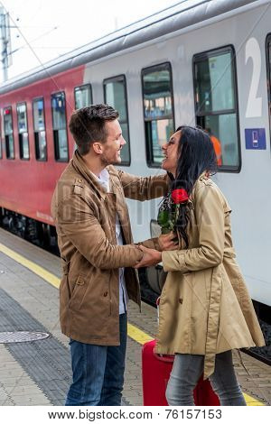 pair on arrival on a platform at a station
