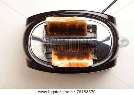 Black Toaster, Two Burnt Black Slices Of Bread