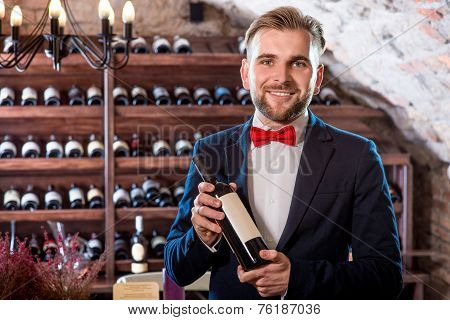 Sommelier in the wine cellar