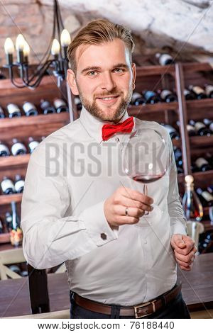 Sommelier in the wine cellar