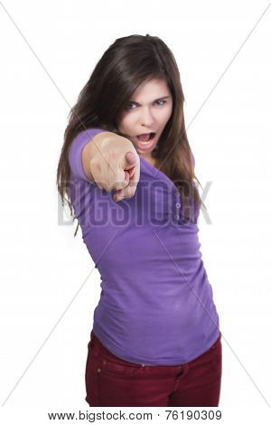 Brunette angry woman shout and point a finger on you isolated on white