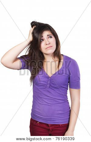 Brunette woman looking up scratching her head dumbfounded isolated on white