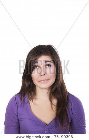 Brunette woman looking up dumbfounded isolated on white