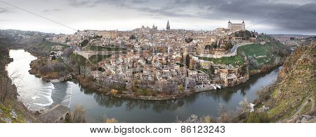 Toledo Panoramic View At Sunset With Tajo River In Spain