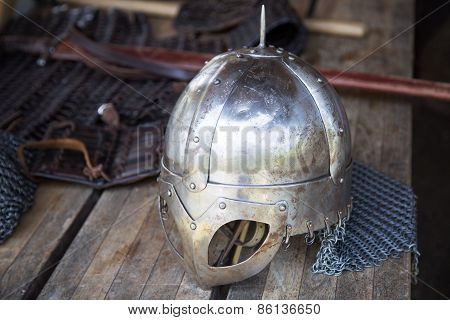 Replica Of Viking Helmet On Wooden Table