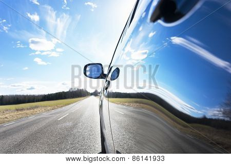 Sky Reflected In Car
