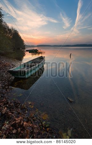 Sunset Lake With Fisherman Boat Landscape.