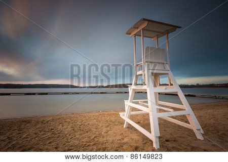 Lifeguard Hut On Lake Shore. Long Exposure Photo