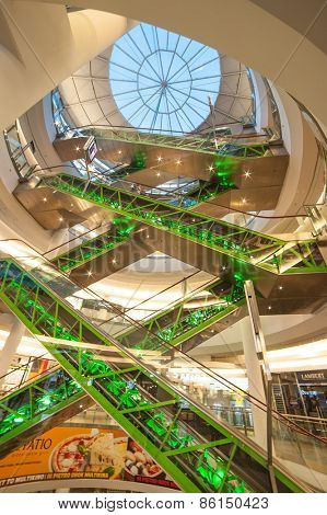 WARSAW, POLAND - NOV 1: The shopping mall, called Golden Terraces, with modern architecture at night in Warsaw, Poland on November 1, 2014. It is a major mall next to the central station.