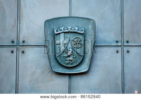 Relief Carving On A Metallic Door - Caot Of Arms