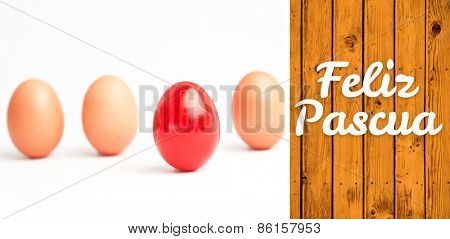 Feliz pascua against wooden planks