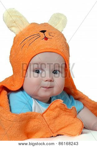 Cute baby boy in towel
