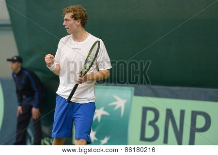 DNEPROPETROVSK, UKRAINE - APRIL 5, 2013: Isak Arvidsson, Sweden in the Davis Cup match Ukraine vs Sweden. Ukraine won the match 3-2