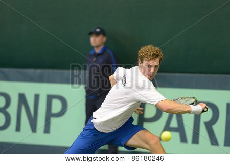 DNEPROPETROVSK, UKRAINE - APRIL 5, 2013: Isak Arvidsson, Sweden in the Davis Cup match Ukraine vs Sweden. Ukraine won the match 3-2