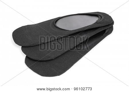 some pairs of black ballerina socks on a white background