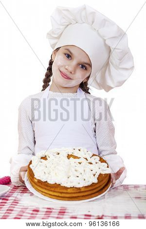 Cooking and people concept - smiling little girl in cook hat, isolated on white background