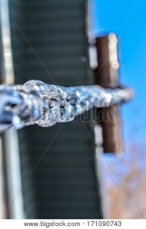 Photo of iced water on a chain