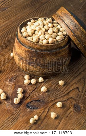Portion of Chick Peas in wooden bowl.
