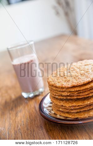 Smoothie And Biscuits On A Wooden Table