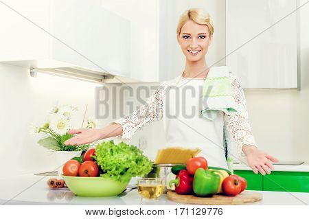 Young woman in the kitchen.Healthy Food. Dieting Concept. Healthy Lifestyle. Cooking At Home.