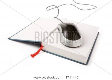 เมาส์คอมพิวเตอร์และหนังสือ