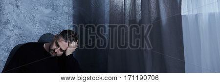 Depressed Man Sitting Alone