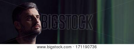 Widower In Dark Room