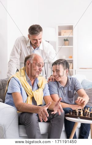 Boy Playing Chess With Grandpa