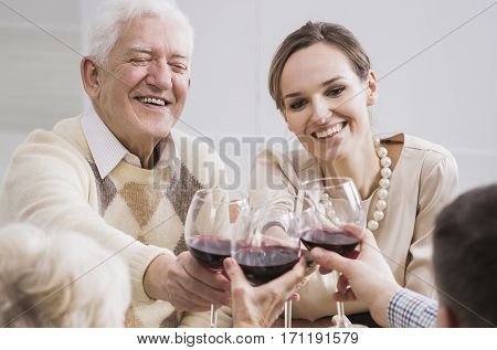 Cheerful Father And Daughter Making A Toast