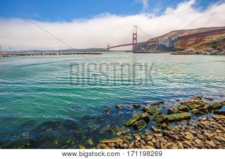 Landscape of Golden Gate Bridge from Presidio Yacht Club, north shore, Horseshoe Bay, Sausalito, California, United States. Symbol, icon and landmark of San Francisco. Travel and holidays concept.
