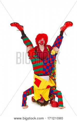 Paar lustige voll gekleidet kopfüber Clowns.