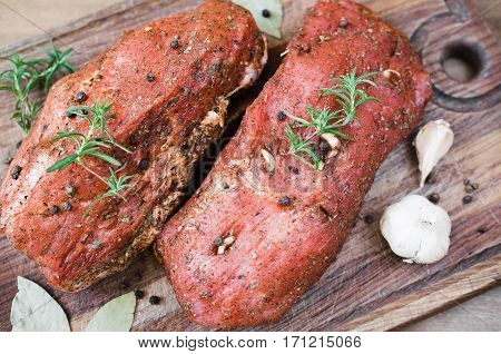 Fresh Raw Marinated Meat on a Wooden Table. Selective Focus. Top View.