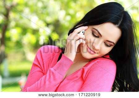 Close Up Of A Attractive Young Woman Speaking On Mobile Phone