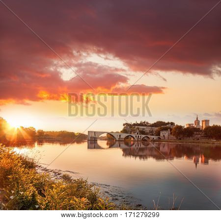 Avignon Old Bridge Against Colorful Sunset In Provence, France
