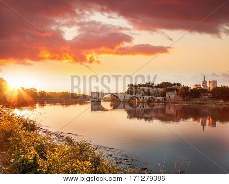 Avignon Old Bridge Against Colorful Sunset In Provence, France