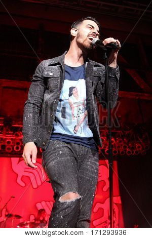 HUNTINGTON, NY-FEB 8: Joe Jonas of DNCE performs onstage at the Paramount on February 8, 2017 in Huntington, New York. 