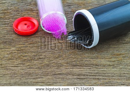 Close up capillary tube with blood lancet Medical equipment on wooden backgroundselective focus.