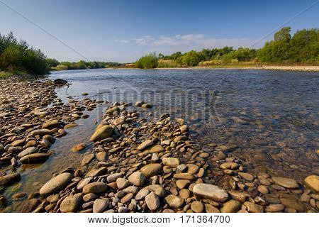 Trout fishing on the mountain river, very beautiful nature.