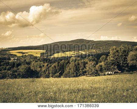 Middle European countryside, Czech republic, Jeseniky in summer, meadow under the Mala Destna mountain, nostalgic aged photo feeling