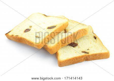 Raisin bread is cut into three pieces put on a white background.
