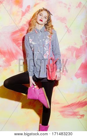Pretty Girl In Pink Ugg Boots With Stylish Bag