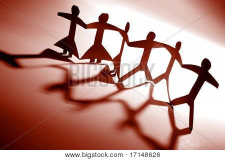 Paper-chain people holding hands