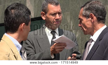 A Business Man Giving Important Documents or Contracts