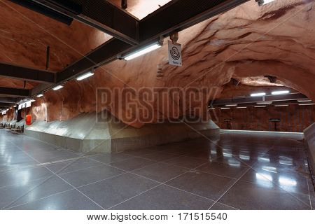 STOCKHOLM, SWEDEN - DECEMBER 26, 2016: Interior of Radhuset subway station. Over 90 subway stations have been decorated with sculptures, mosaics, paintings and reliefs by over 150 artists