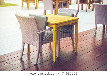 Interior wood chair in cafe outdoor .