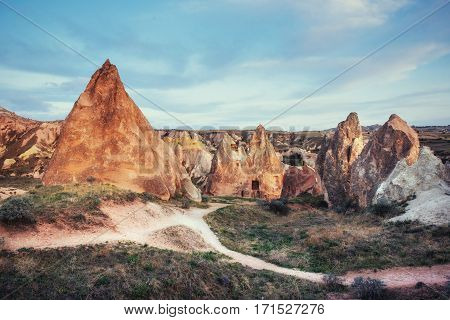 TUnique geological formations in valley in Cappadocia.