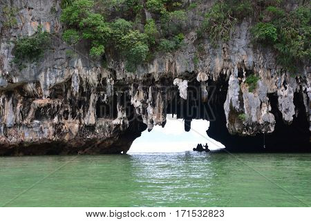 Tham Lod Yai (Grotto Cave) Jungle covered limestone cliffs at Phang Nga Bay