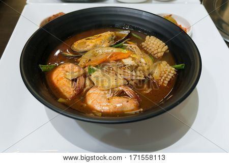 Closeup Jjamppong Or Jjampong (korean Spicy Seafood Noodle Soup)