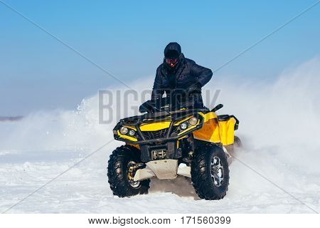 Quad Bike In Motion, Ride On Lake On Snow.