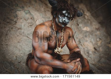 Bodyart Man Angry Minotaur With Axe In Cave. Close-up Portrait